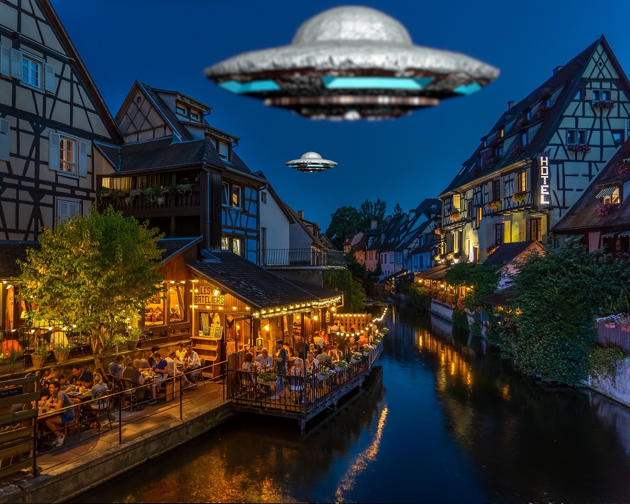 A depiction of a UFO over a French town