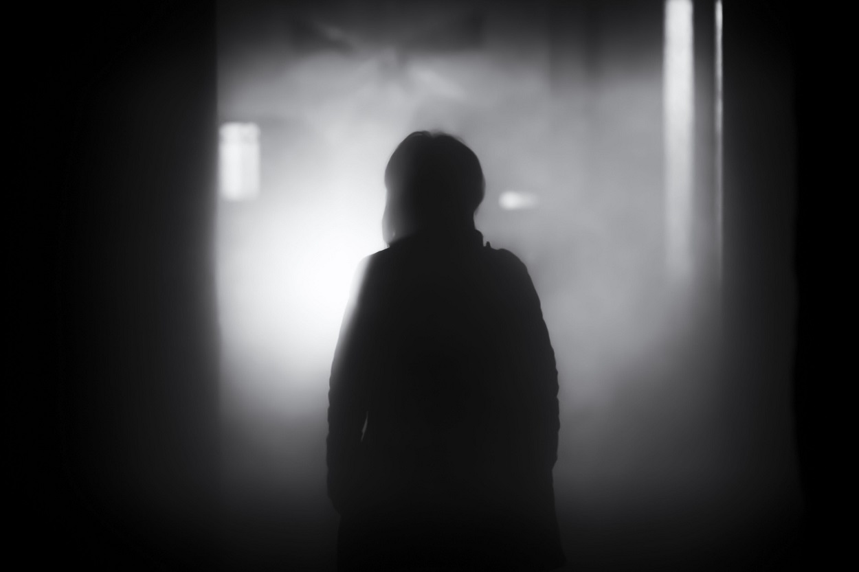 A picture of a shadowy person