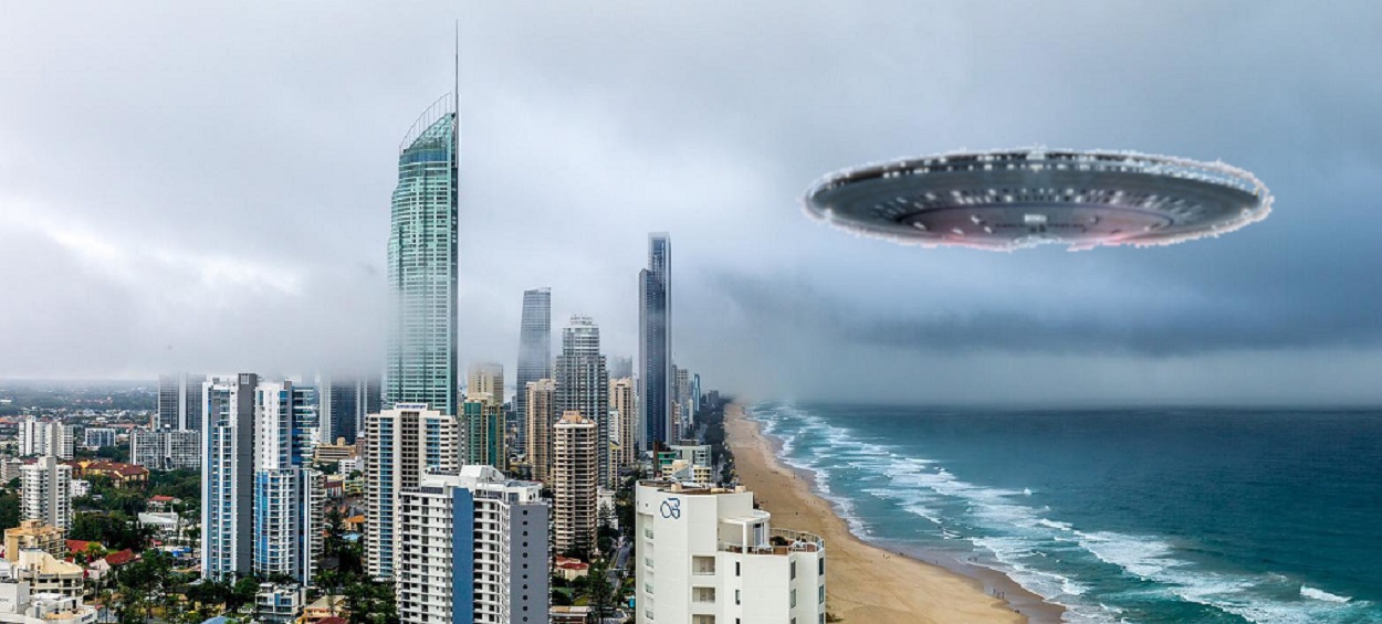 A depiction of a UFO over an Australian beach