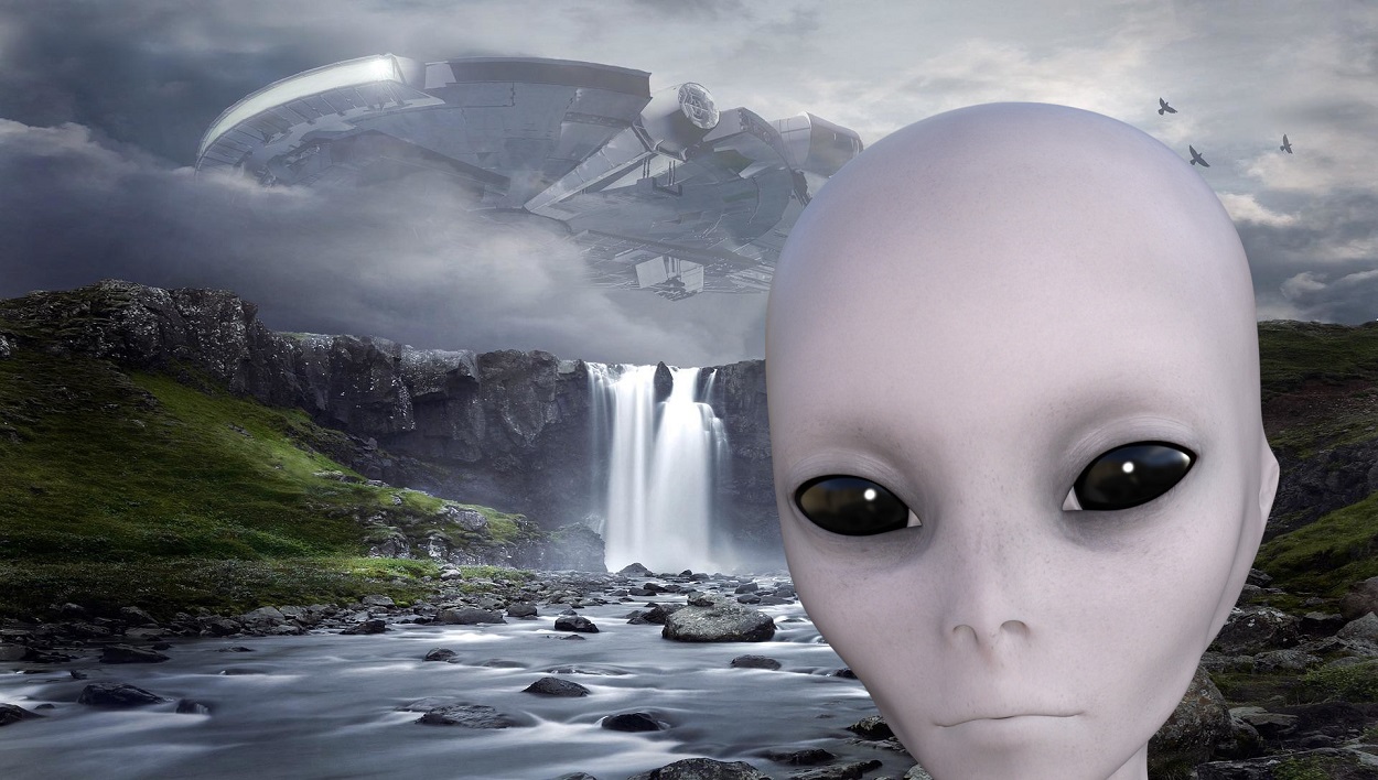 A superimposed alien face over a picture of a UFO