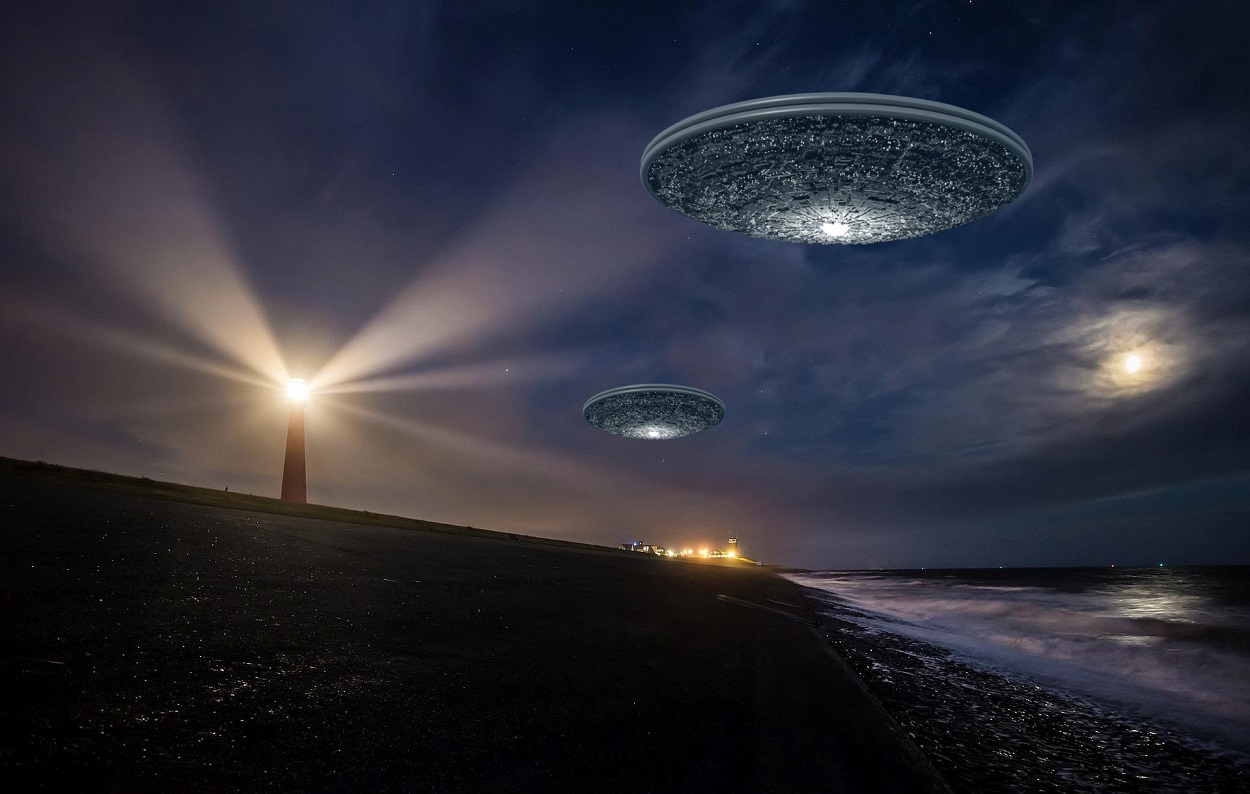A depiction of two UFOs over the beach