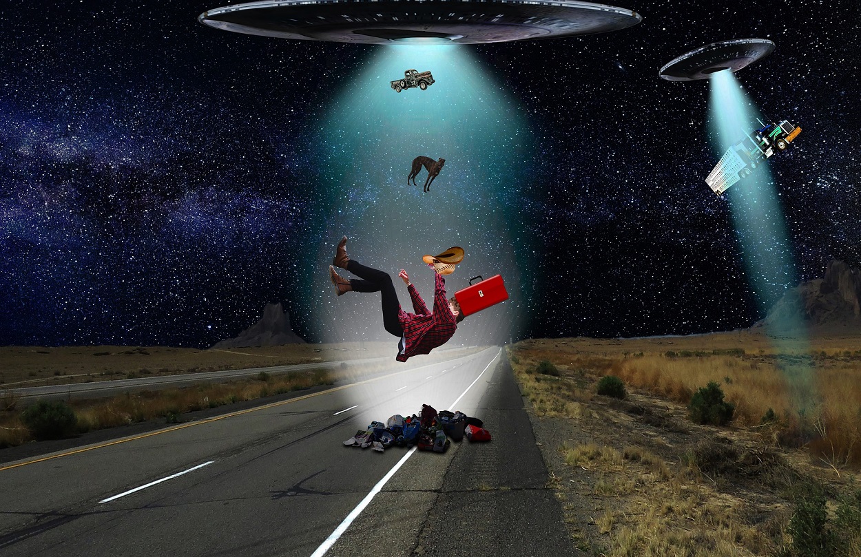 A depiction of a person being dropped from a UFO